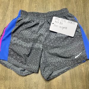 Grey, and purple NIKE shorts in size XL (girls)